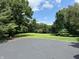 Expansive grassy yard with a gently sloping hill, perfect for outdoor recreation at 7601 S 700 W, Morgantown, IN 46160