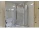 Simple basement bathroom with a shower and toilet at 7601 S 700 W, Morgantown, IN 46160