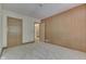 Bedroom with wood paneled walls and carpeted floor at 7601 S 700 W, Morgantown, IN 46160