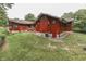Red house with a large backyard at 7601 S 700 W, Morgantown, IN 46160
