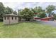 Stone and red brick home with gazebo and landscaping at 7601 S 700 W, Morgantown, IN 46160