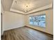 Bright dining room with hardwood floors and large windows at 15109 Larchwood Dr, Westfield, IN 46074