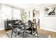 Cozy dining area with a round black table and four chairs at 21 E Hanna Ave, Indianapolis, IN 46227