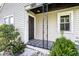 Inviting front porch with decorative tile at 21 E Hanna Ave, Indianapolis, IN 46227