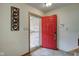 Bright entryway with a red door and wood door at 303 Wellington Overlook, Noblesville, IN 46060