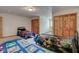 Bedroom with two twin beds, ample closet space, and neutral carpeting at 303 Wellington Overlook, Noblesville, IN 46060