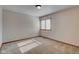 Bright bedroom with neutral walls, carpet, and window coverings at 303 Wellington Overlook, Noblesville, IN 46060