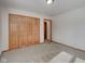 Simple bedroom with double door closet and access to hallway at 303 Wellington Overlook, Noblesville, IN 46060