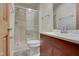 Clean bathroom with a shower/tub combo and wood vanity at 303 Wellington Overlook, Noblesville, IN 46060