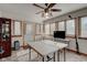 Bright sunroom with ample natural light and tile flooring at 303 Wellington Overlook, Noblesville, IN 46060