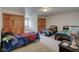 bedroom with two twin beds and wood closets at 303 Wellington Overlook, Noblesville, IN 46060