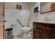 Clean bathroom featuring a vanity and toilet at 303 Wellington Overlook, Noblesville, IN 46060