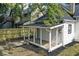 White shed with covered patio and backyard view at 1046 Dawson St, Indianapolis, IN 46203
