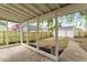 Covered patio overlooking backyard with shed at 1046 Dawson St, Indianapolis, IN 46203