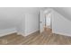 Bright bedroom with hardwood floors and access to hallway at 1046 Dawson St, Indianapolis, IN 46203
