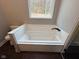Relaxing bathroom with a soaking tub and marble-look accents at 3380 N Pine Song Dr, Martinsville, IN 46151