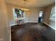 Elegant dining room with dark tile flooring and a large window at 3380 N Pine Song Dr, Martinsville, IN 46151