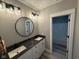 Main bathroom with double vanity and separate tub/shower at 3380 N Pine Song Dr, Martinsville, IN 46151