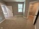 Well-lit bedroom with a walk-in closet and carpet flooring at 3380 N Pine Song Dr, Martinsville, IN 46151