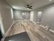 Open living area featuring vinyl plank flooring and recessed lighting at 3380 N Pine Song Dr, Martinsville, IN 46151