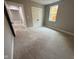 Spacious bedroom with neutral walls and carpet flooring at 3380 N Pine Song Dr, Martinsville, IN 46151