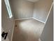 Simple bedroom with neutral-toned walls and carpeted flooring at 3380 N Pine Song Dr, Martinsville, IN 46151