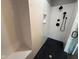 Walk-in shower with marble-look walls and a black tiled shower base at 3380 N Pine Song Dr, Martinsville, IN 46151