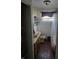 Small bathroom with a shower, toilet, and vanity at 3536 N Audubon Rd, Indianapolis, IN 46218