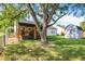 Spacious backyard with shed, tree, and stone path at 12122 Bearsdale Dr, Indianapolis, IN 46235