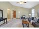 Spacious living room with gray sofa and ample natural light at 12122 Bearsdale Dr, Indianapolis, IN 46235