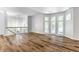 Open living room showcasing hardwood floors and a loft view at 571 Lockerbie S Cir, Indianapolis, IN 46202