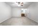 Spacious bedroom with ceiling fan and en-suite bathroom access at 571 Lockerbie S Cir, Indianapolis, IN 46202