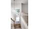 Bright entryway with hardwood floors and staircase at 571 Lockerbie S Cir, Indianapolis, IN 46202