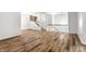 Dining room with hardwood floors and staircase access at 571 Lockerbie S Cir, Indianapolis, IN 46202
