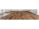Spacious living room featuring hardwood floors and abundant natural light at 571 Lockerbie S Cir, Indianapolis, IN 46202