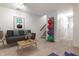Finished basement with a comfy couch and exercise balls at 571 Lockerbie S Cir, Indianapolis, IN 46202