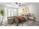 Cozy bedroom with a plush bed and bay window at 571 Lockerbie S Cir, Indianapolis, IN 46202