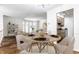 Charming dining room with a round table and four chairs at 571 Lockerbie S Cir, Indianapolis, IN 46202