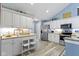 White kitchen with granite countertops and ample storage at 16948 Maple Springs Way, Westfield, IN 46074