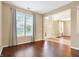 Spacious living room featuring hardwood floors and large windows at 201 Creekview Cir, Mooresville, IN 46158