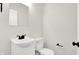 Clean bathroom with white vanity and toilet at 324 N Tacoma Ave, Indianapolis, IN 46201