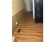 Kitchen with light brown vinyl flooring and a black refrigerator at 9145 Shenandoah Dr, Indianapolis, IN 46229