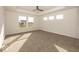 Large main bedroom with carpeted floors and multiple windows at 6631 Dogwood Dr, McCordsville, IN 46055