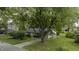 Ranch home with spacious yard, large tree, and convenient ramp access at 451 Emerson Rd, Carmel, IN 46032