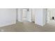 Bright hallway with access to multiple rooms at 10125 Caprock Canyon Dr, Indianapolis, IN 46229