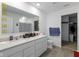 Modern bathroom with double vanity and walk-in shower at 10125 Caprock Canyon Dr, Indianapolis, IN 46229