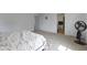 Bright bedroom with carpeted floor and ensuite bathroom at 10125 Caprock Canyon Dr, Indianapolis, IN 46229