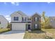 Two-story home with brick and siding exterior at 10125 Caprock Canyon Dr, Indianapolis, IN 46229