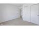 Simple bedroom with carpet flooring and double door closet at 10125 Caprock Canyon Dr, Indianapolis, IN 46229