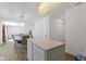 Modern kitchen island with white cabinets and granite countertops at 10125 Caprock Canyon Dr, Indianapolis, IN 46229